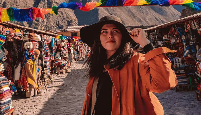 Tourist posing at Chinchero Market