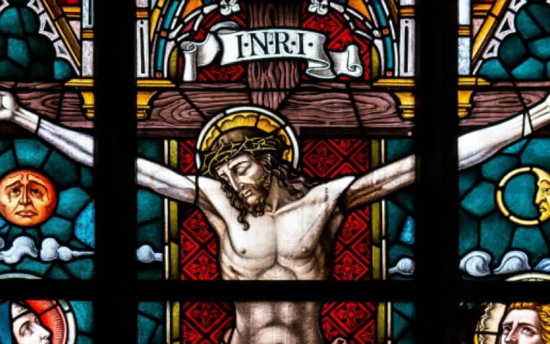 Religious stained glass window referencing the Lord of Miracles, one of Peru's cultural festivities