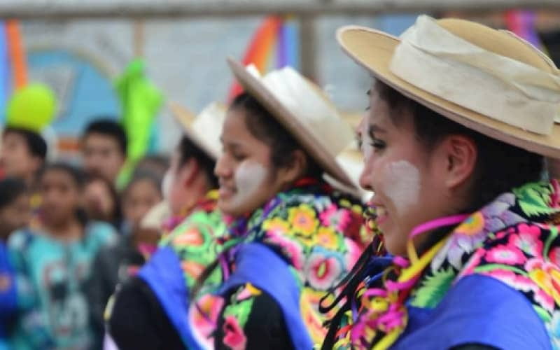Dancers in traditional costumes at Peru's carnivals, an Andean cultural tradition