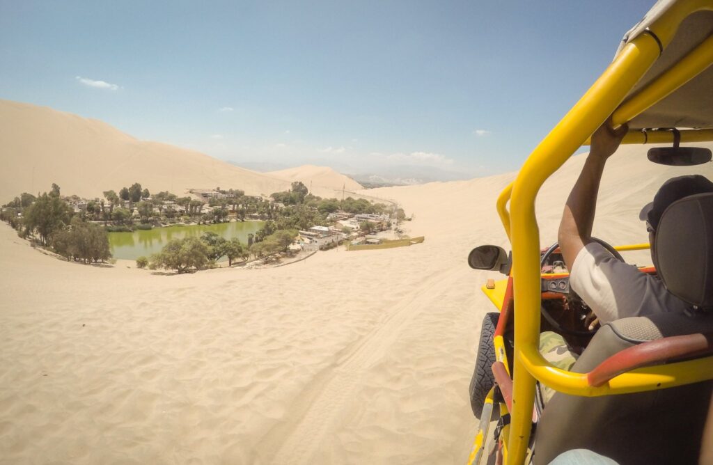 tourists on a buggy adventure in Huacachina